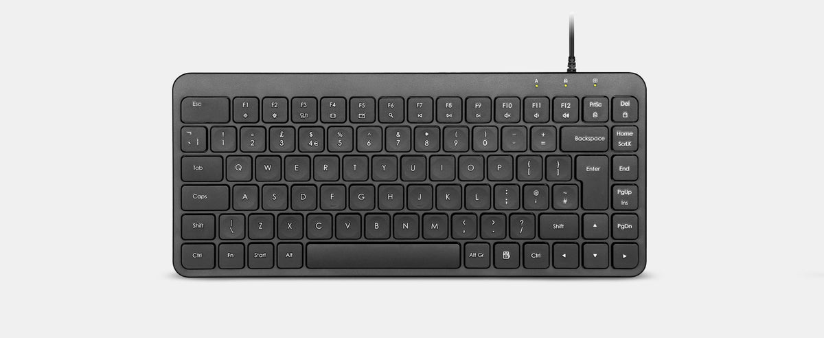 Compact wireless keyboard with black keys on gray background, featuring slim profile and minimalist design.